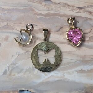 Three Gold Pendants.